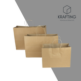 BOLSA DE PAPEL KRAFT CON ASA BOUTIQUE MEDIANA